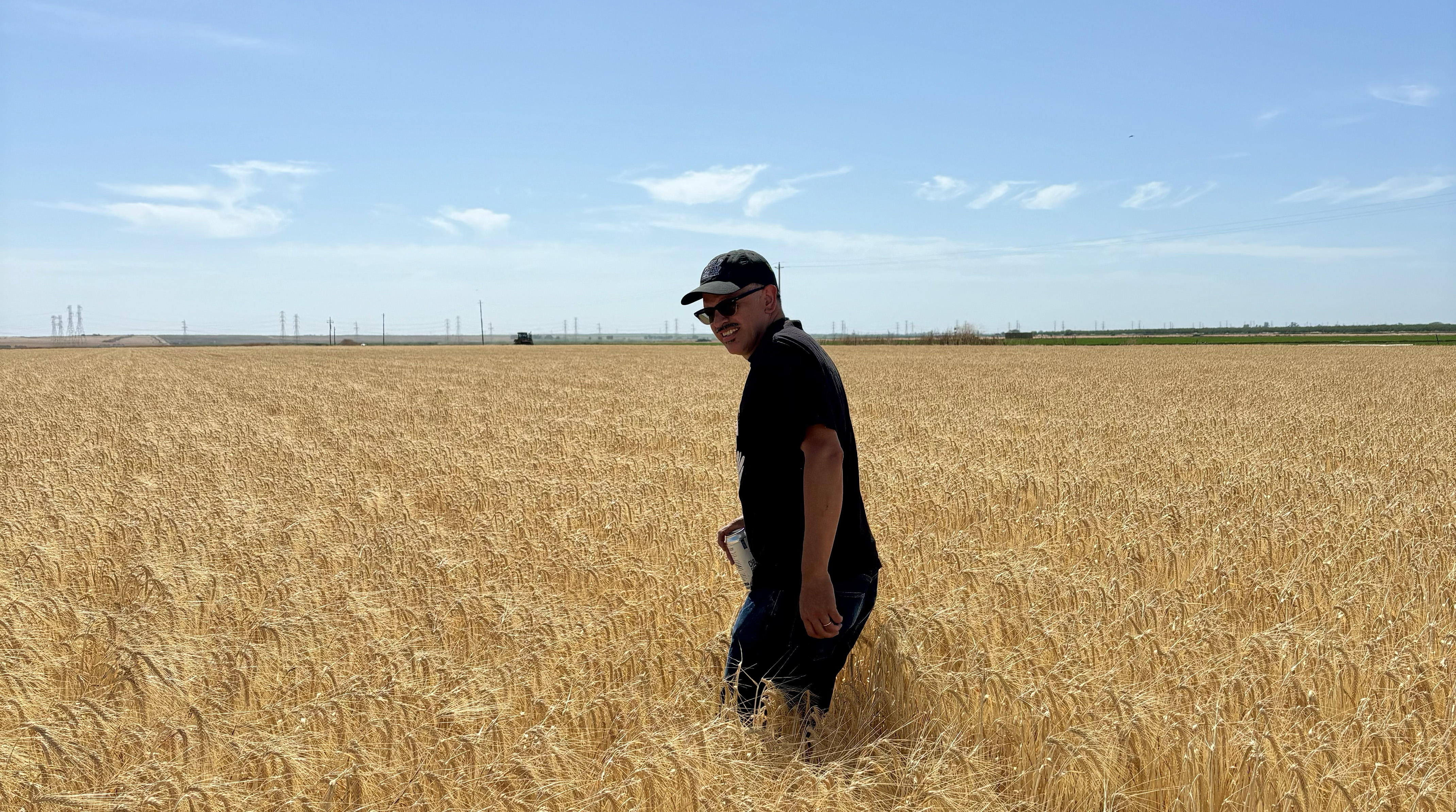 man in a field of barley